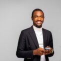 portrait-young-african-american-business-man-using-mobile_216356-294